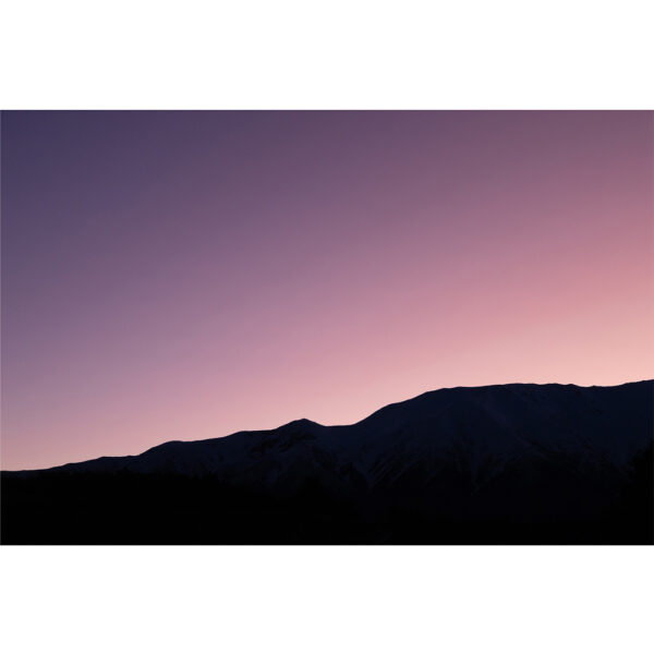 Mountain silhouette at sunrise